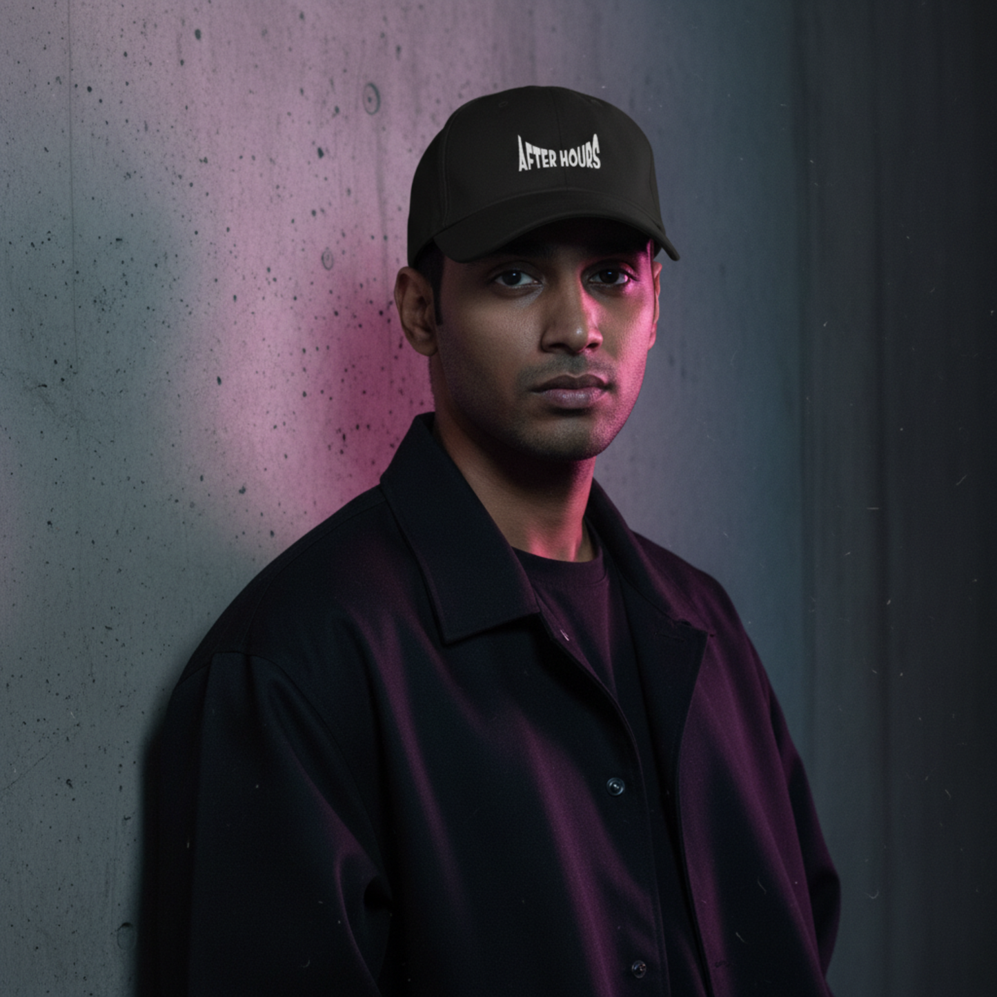 Black cap with 'AFTER HOURS' text embroidered on a grey background