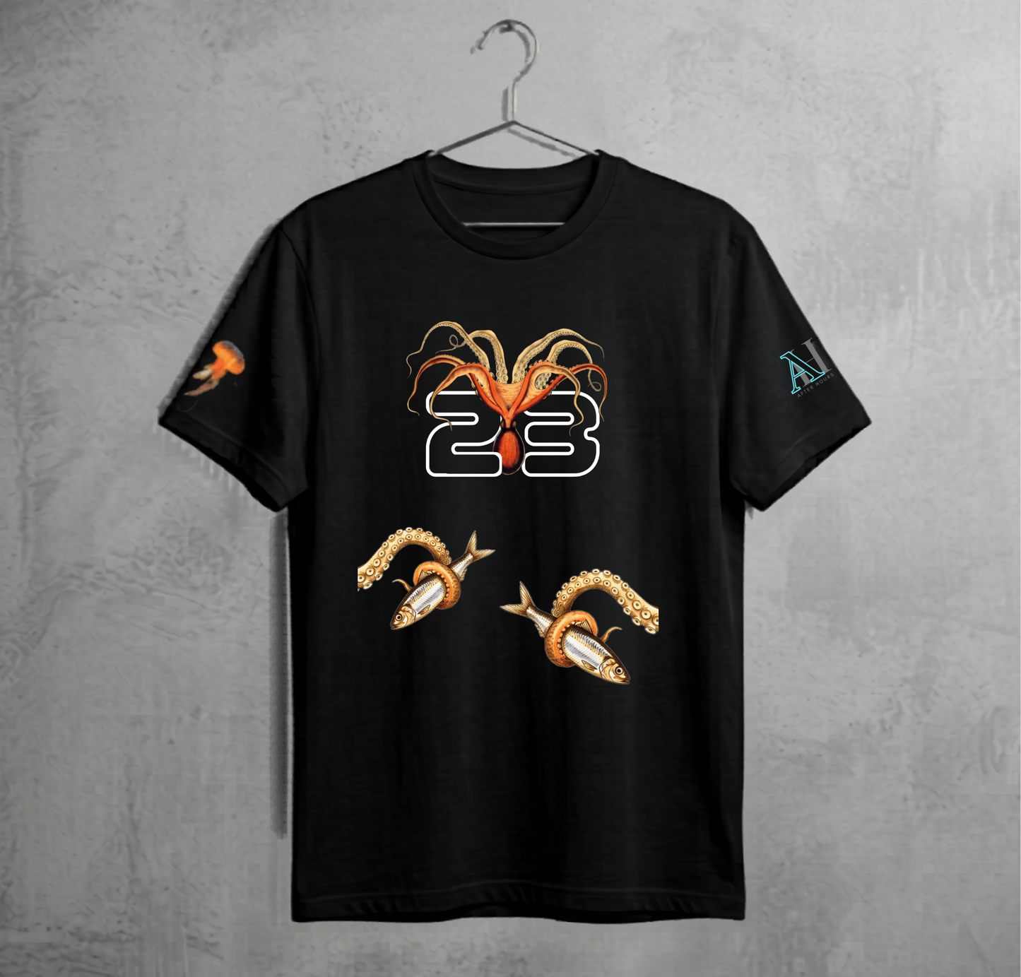 Black t-shirt with graphic designs on a gray textured background