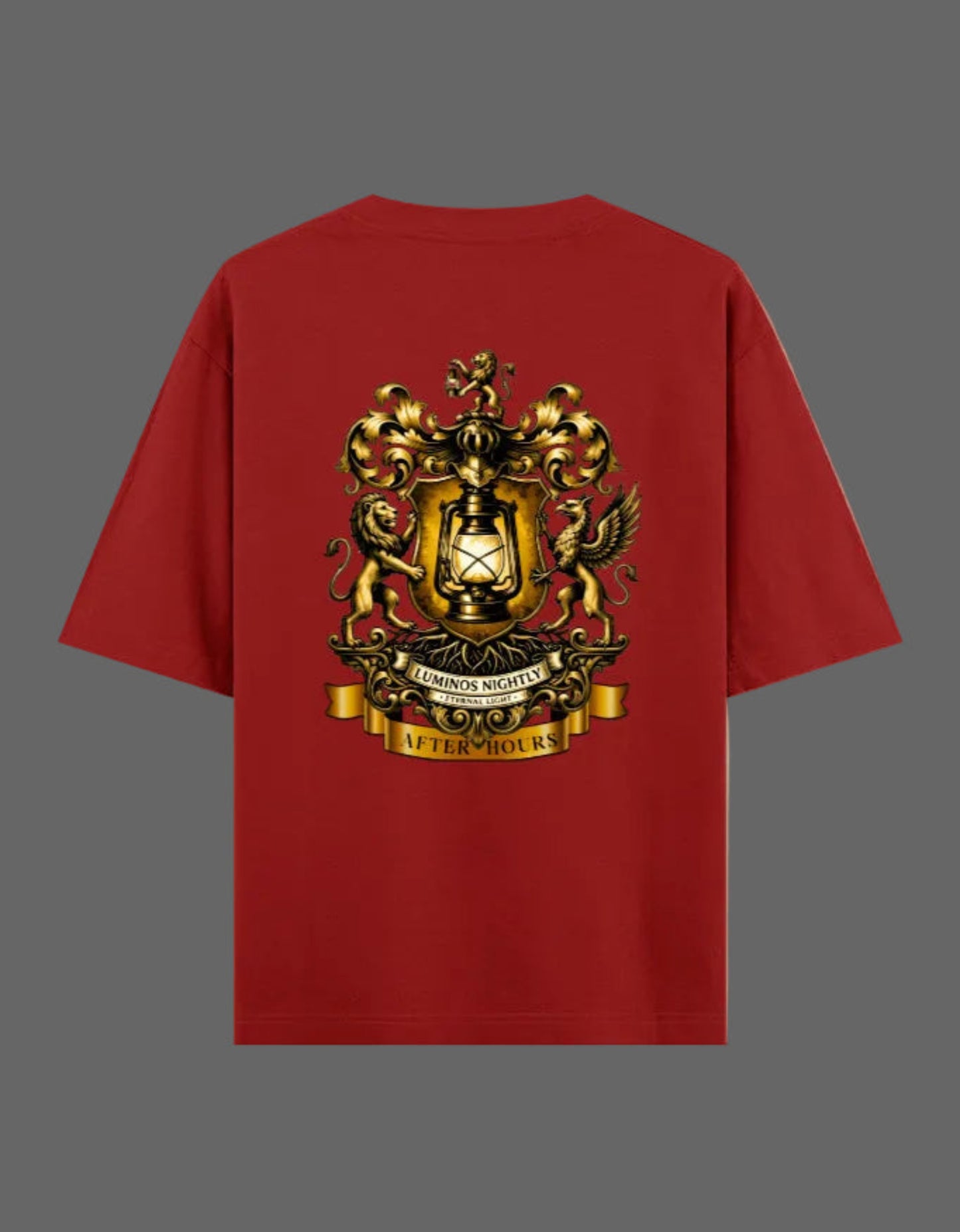 Red t-shirt with a gold After Hours Coat of Arms emblem on the back against a grey background