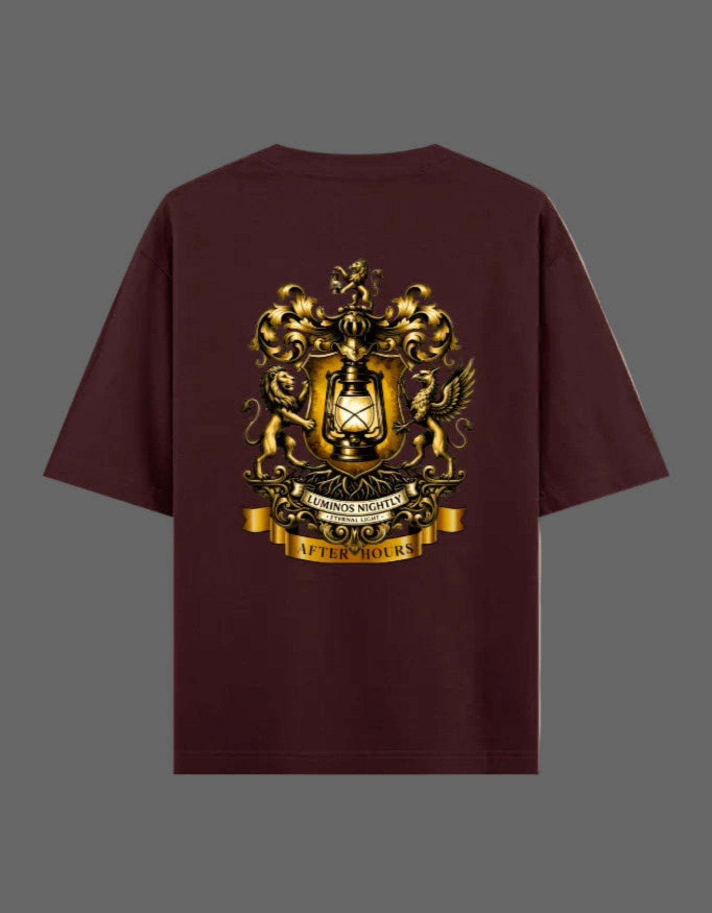 Maroon t-shirt with gold After Hours Coat of Arms emblem on a grey background