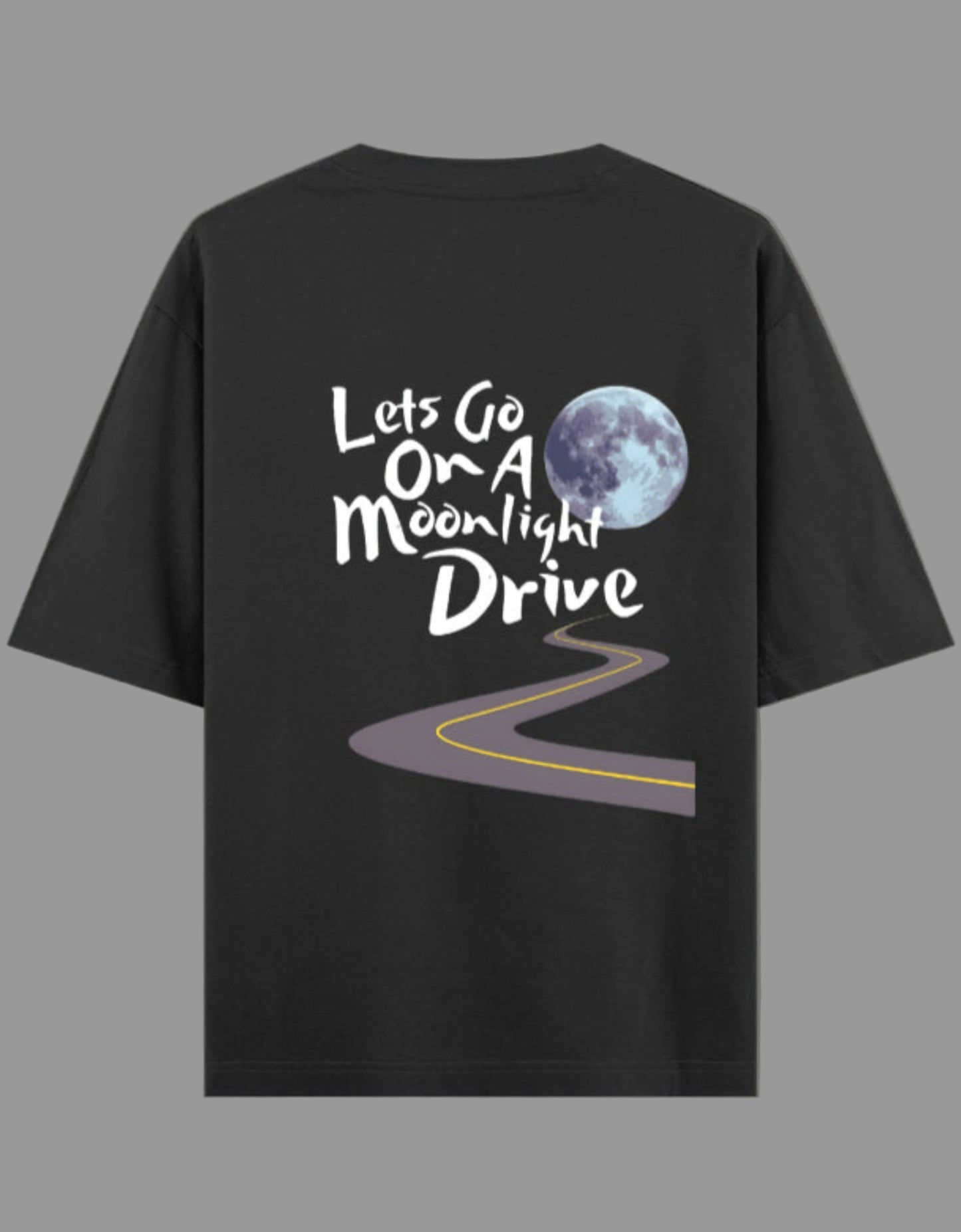 Black t-shirt with 'Let's Go On A Moonlight Drive' text and moon graphic on a gray background