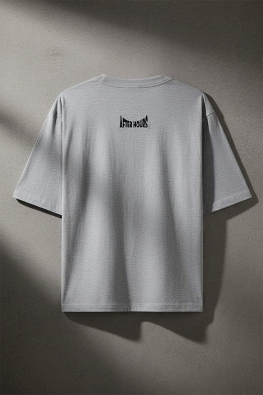 Grey t-shirt with 'After Hours' text embroidered on the back against a grey background