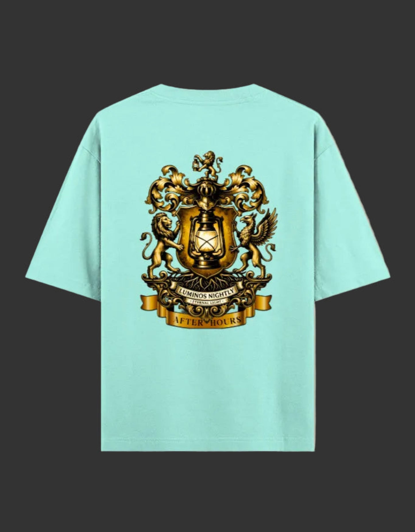 Mint green t-shirt with a gold After Hours Coat of Arms emblem on a grey background