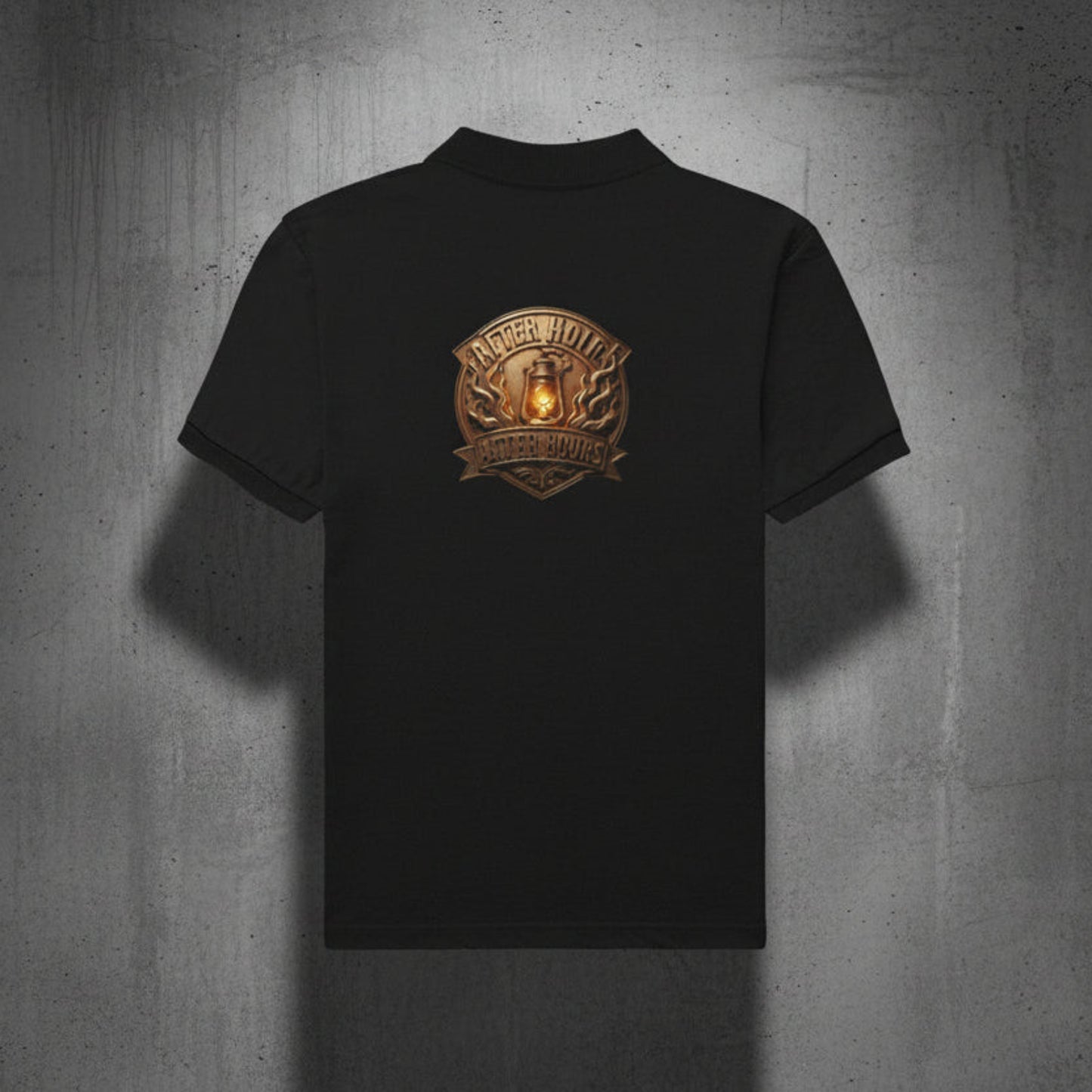 Black t-shirt with a logo on the back against a grey textured background