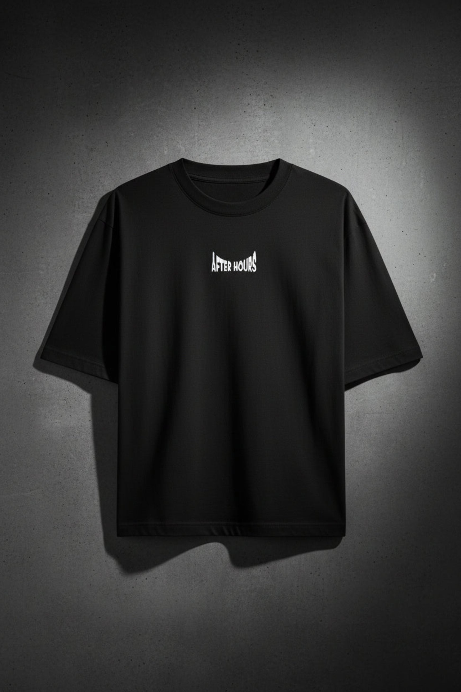 Black t-shirt with 'After Hours' text embroidered on a light gray background