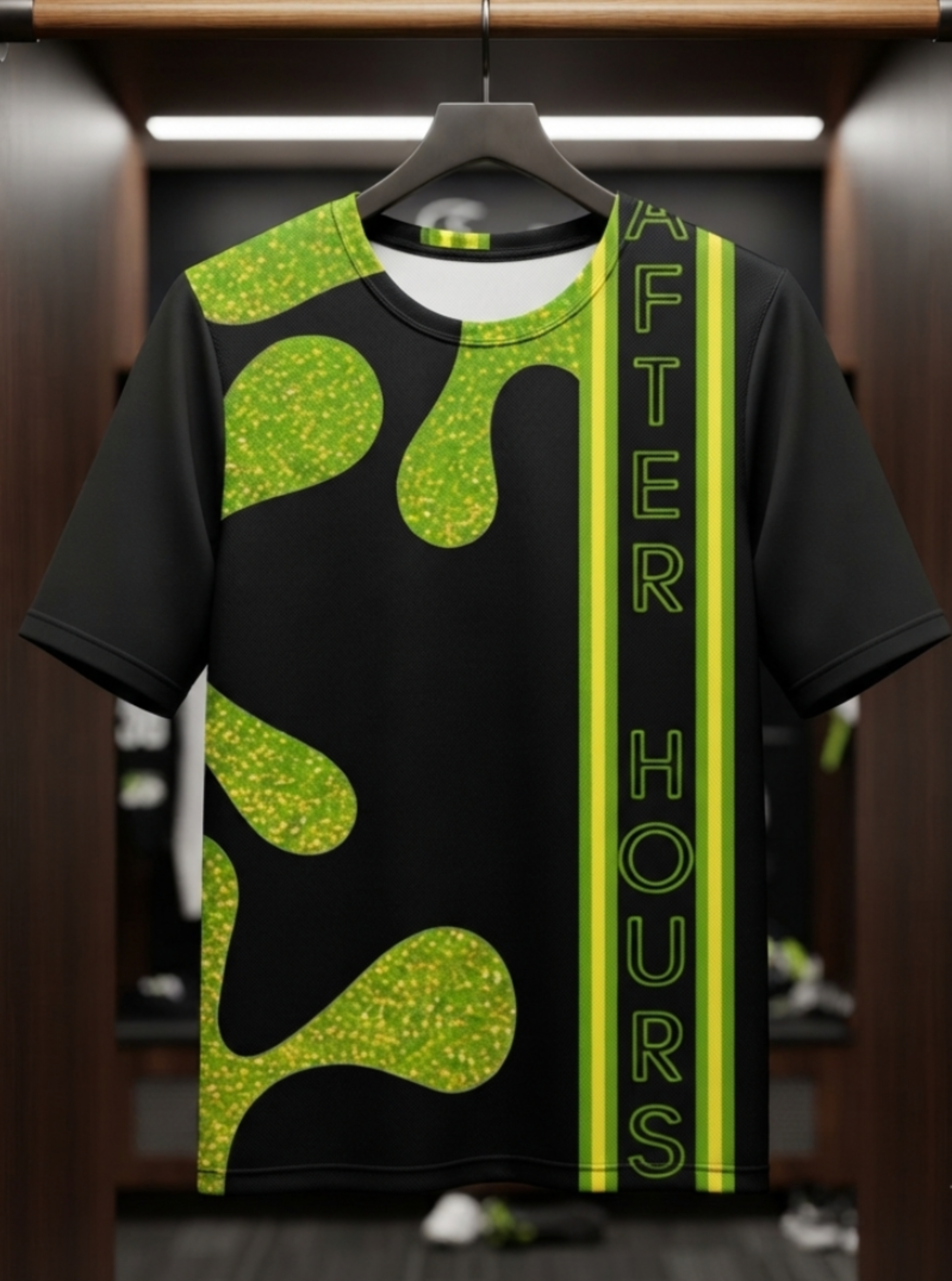 A black short-sleeve athletic T-shirt hanging on a hanger in a locker room setting. The shirt features a bright lime green glitter-textured abstract splatter pattern on the right side and a vertical black stripe with lime green text reading 'AFTER HOURS' down the left side.