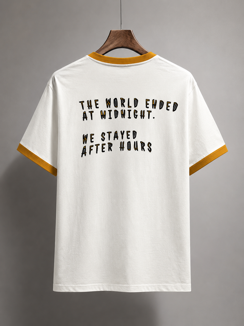 White t-shirt with black text on a gray background