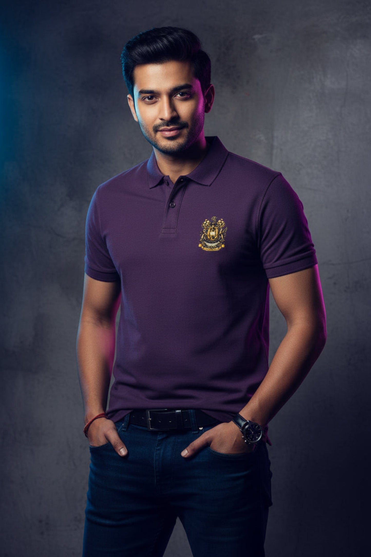 Purple polo shirt with the After Hours Coat of Arms emblem on a grey background