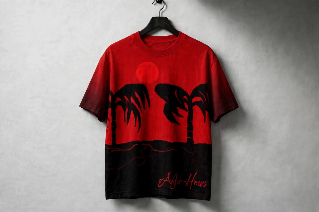 A red and black short-sleeve t-shirt hanging on a black hanger against a textured grey wall. The t-shirt features a graphic of black palm tree silhouettes against a red sunset, with the words 'After Hours' written in red script near the bottom hem.