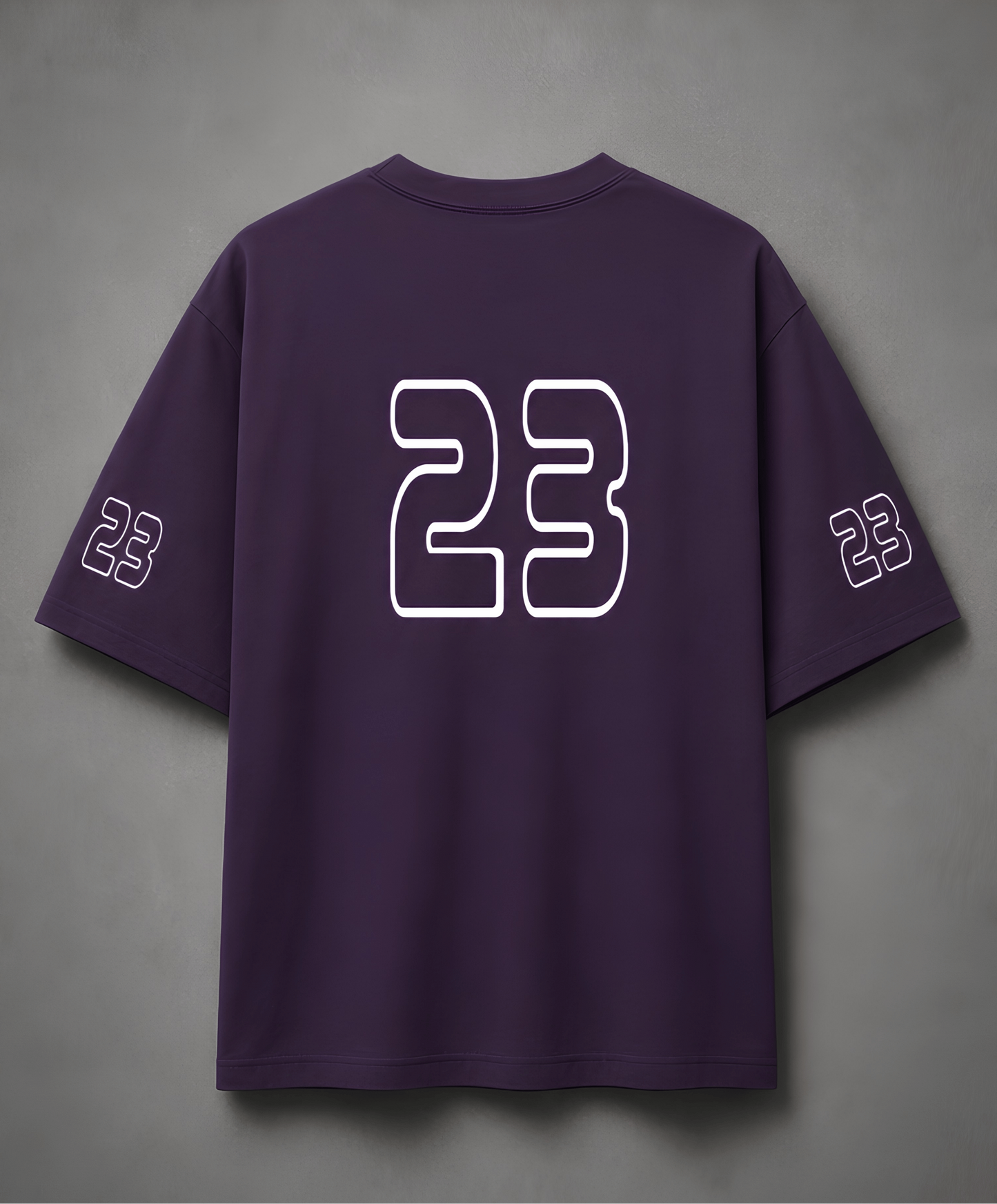 Purple t-shirt with number 23 on a grey background