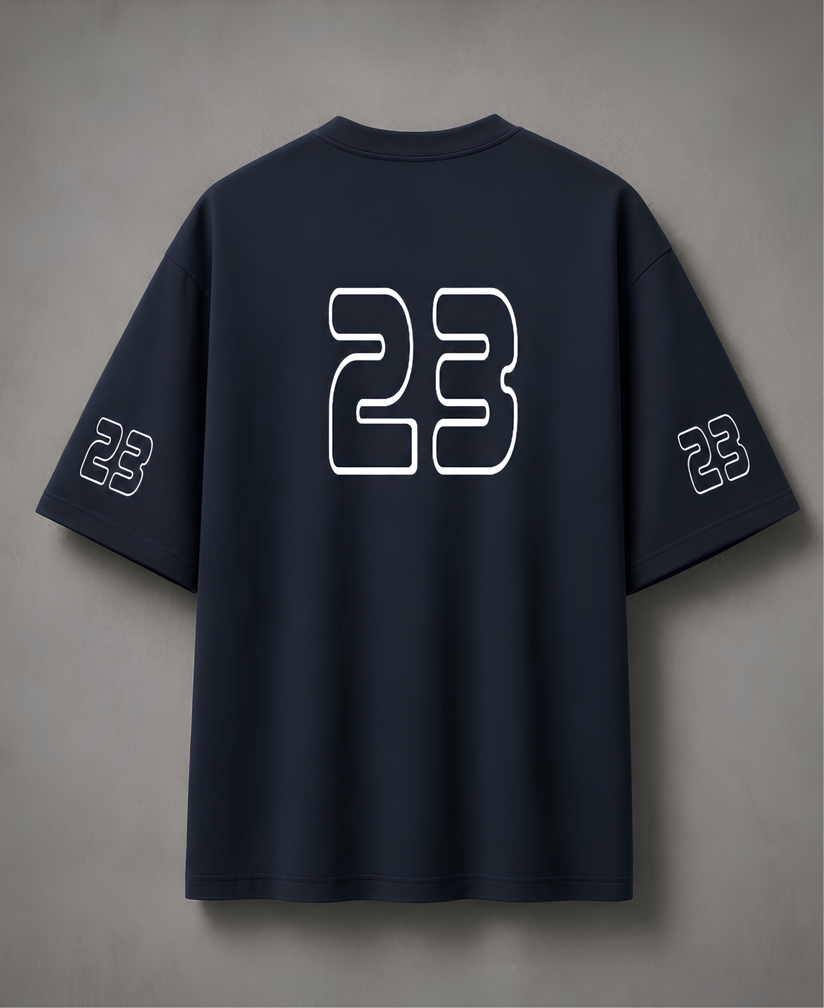 Navy blue t-shirt with number 23 on the back against a grey background