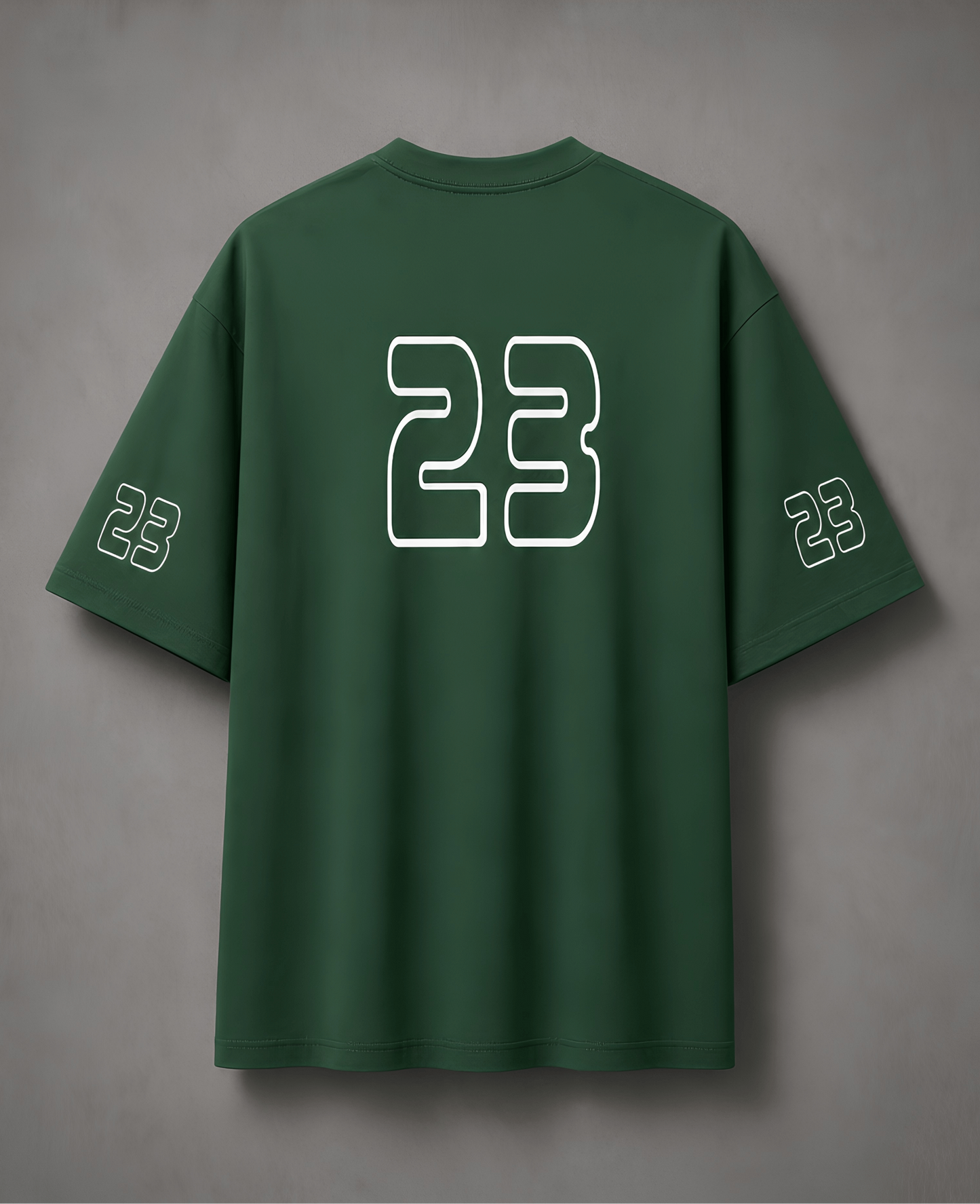 Green t-shirt with number 23 on the back against a grey background