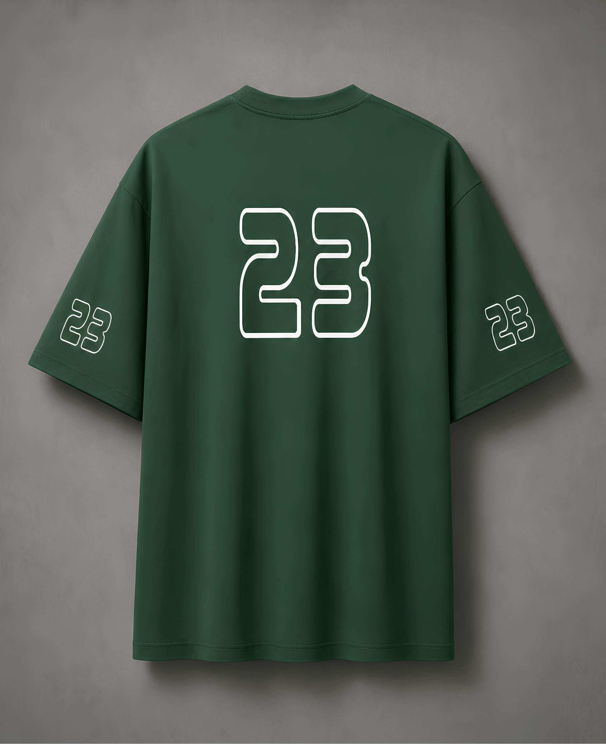 Green t-shirt with number 23 on the back against a grey background