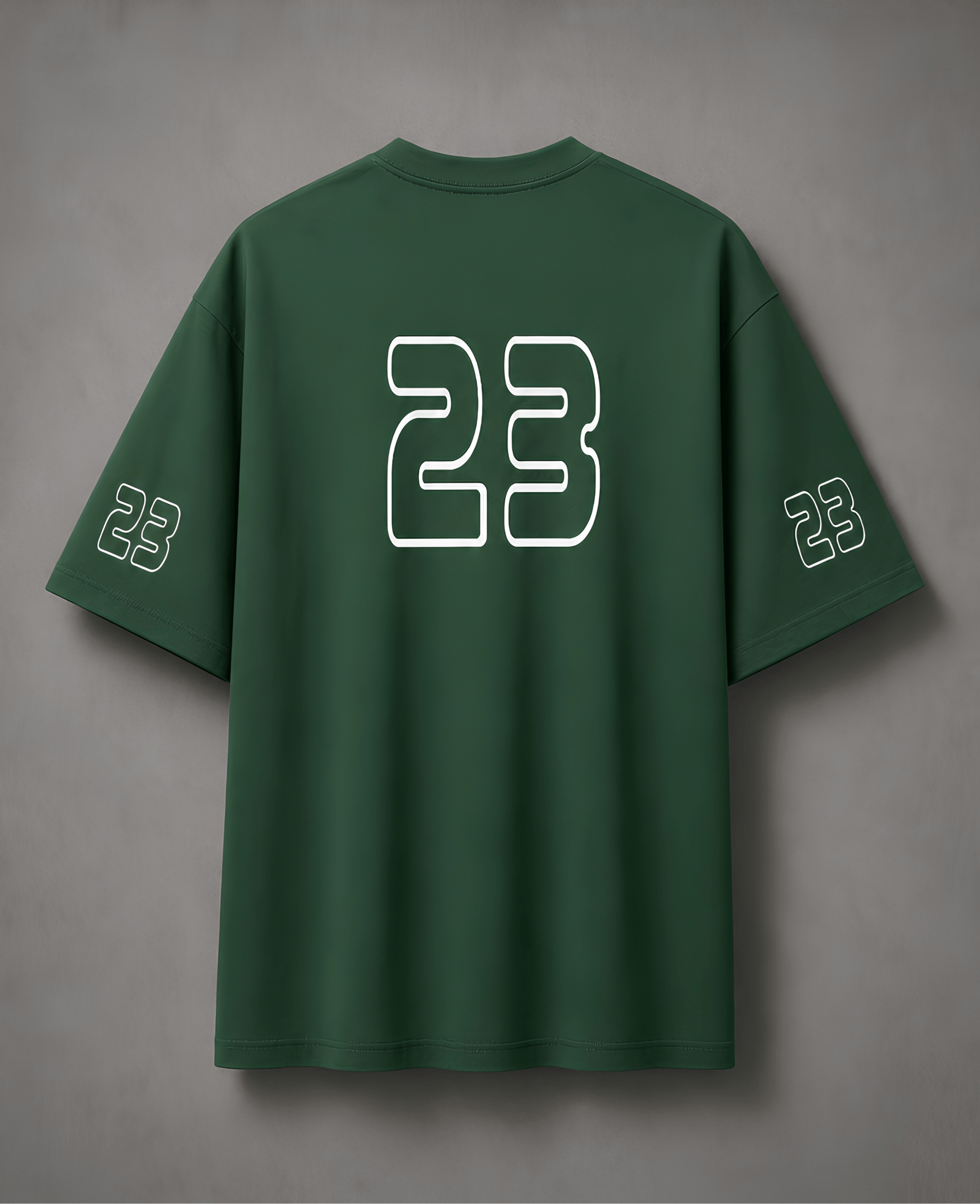 Green t-shirt with number 23 on the back against a grey background