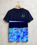 A navy blue t-shirt hanging on a wooden hanger against a textured light grey wall. The shirt features a graphic design with a dark navy sky, white horizon line, and a detailed blue and white wave pattern at the bottom.