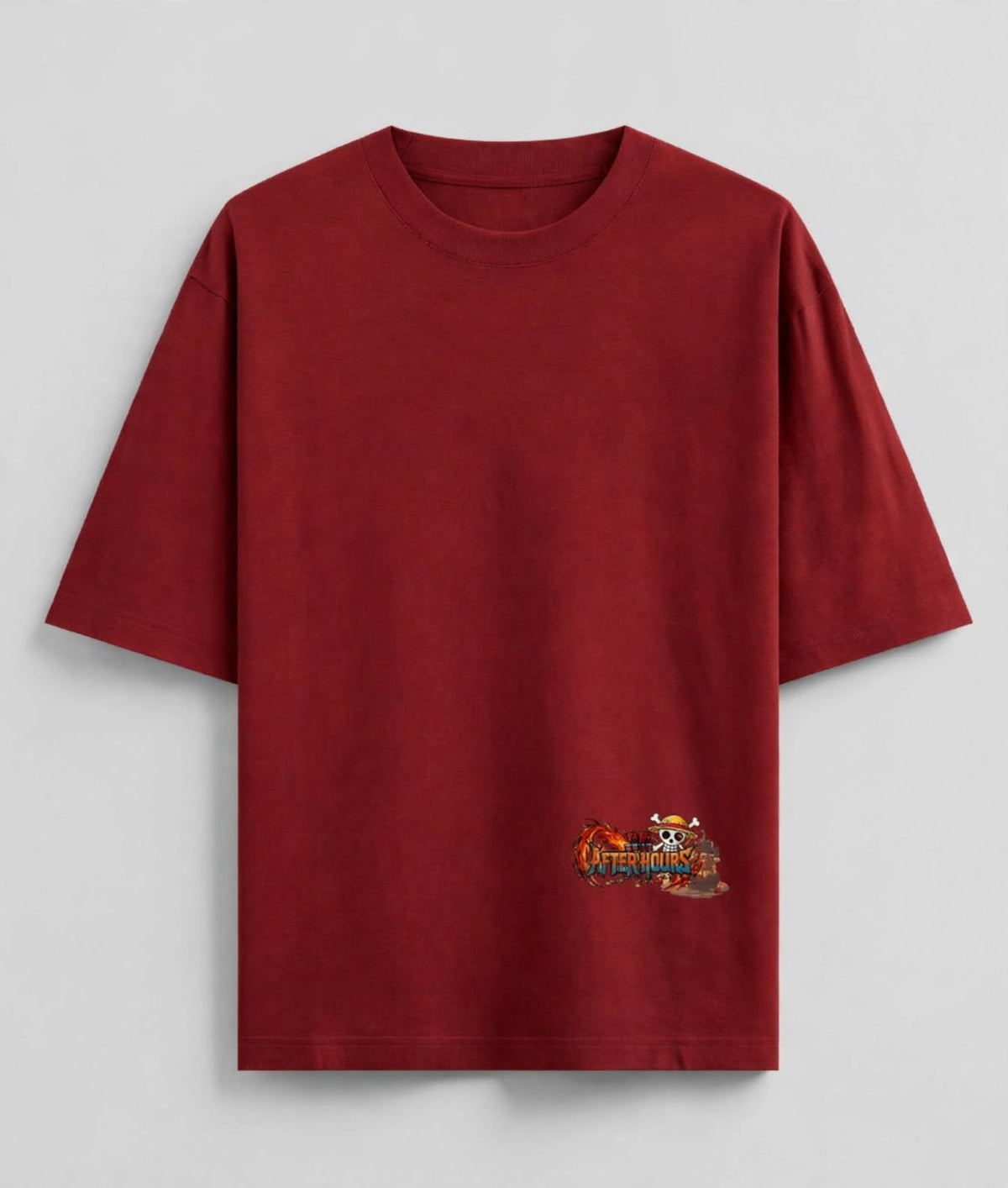 A dark red short-sleeve t-shirt with a small anime graphic on the lower left hem, displayed flat against a light grey background.