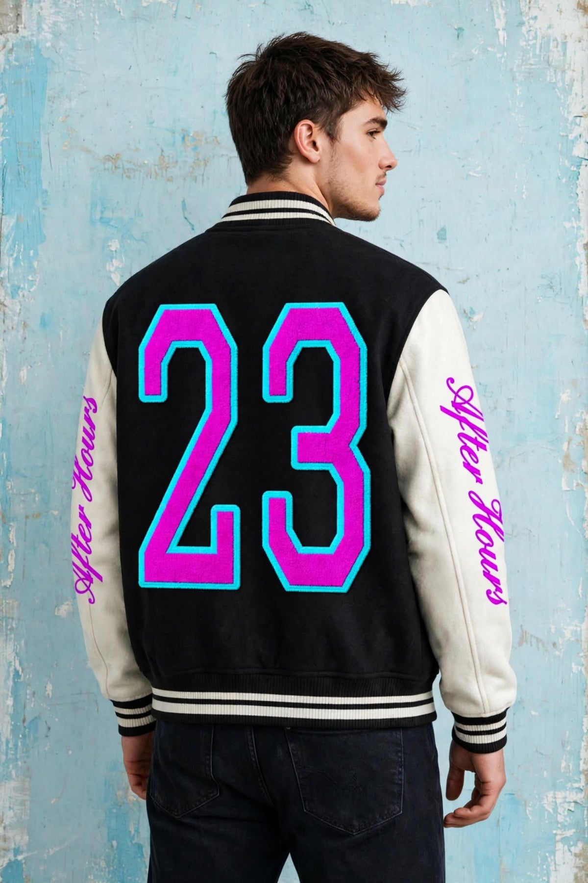 A man wearing a black and white varsity jacket, viewed from the back. The jacket features a large neon pink and cyan number '23' on the back, with 'After Hours' written in pink script on both sleeves.
